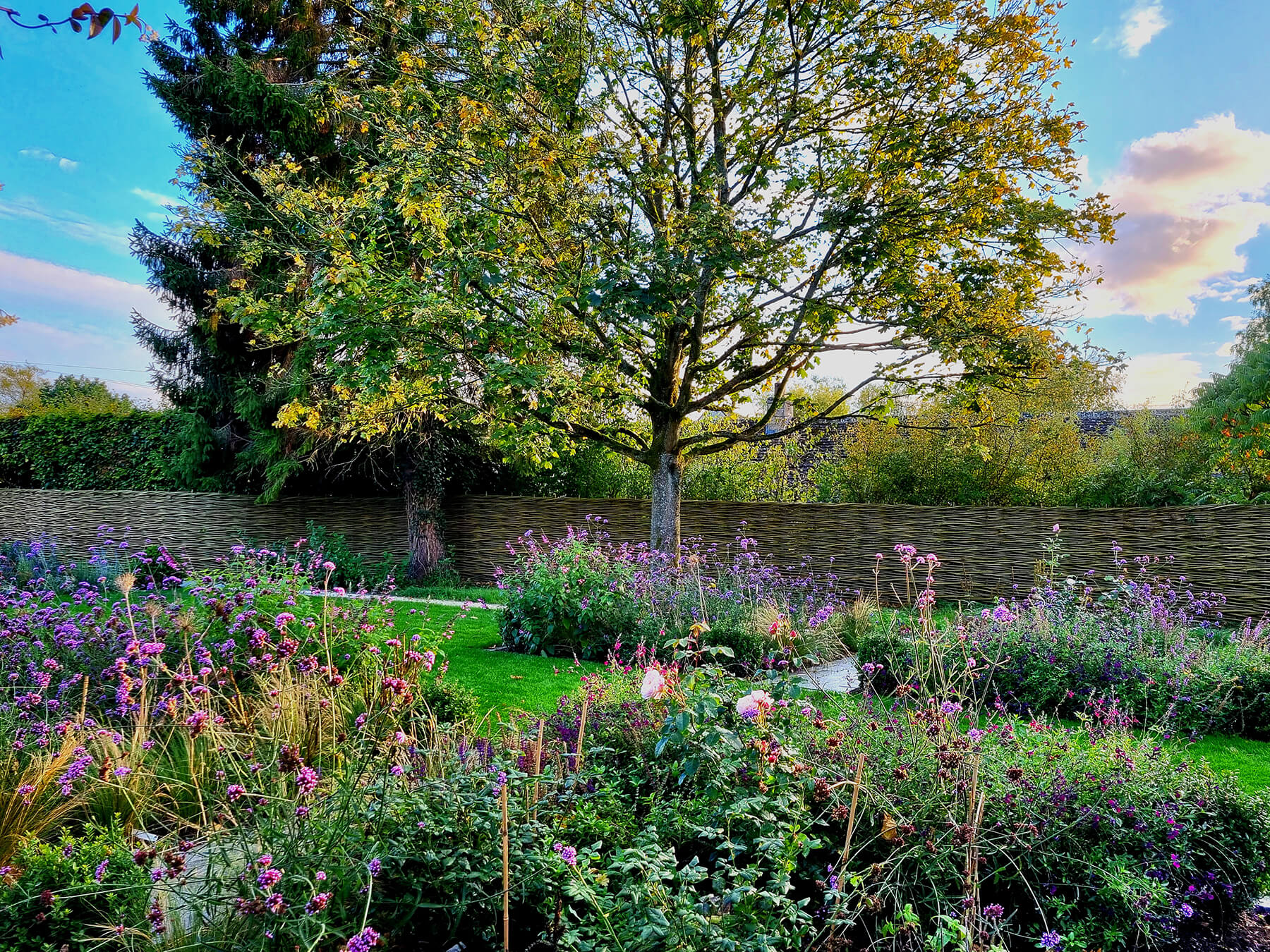 The Modern Cottage Garden, a large modern country garden with formal layout. Designed by April House – Award Winning Cotswolds Garden Design